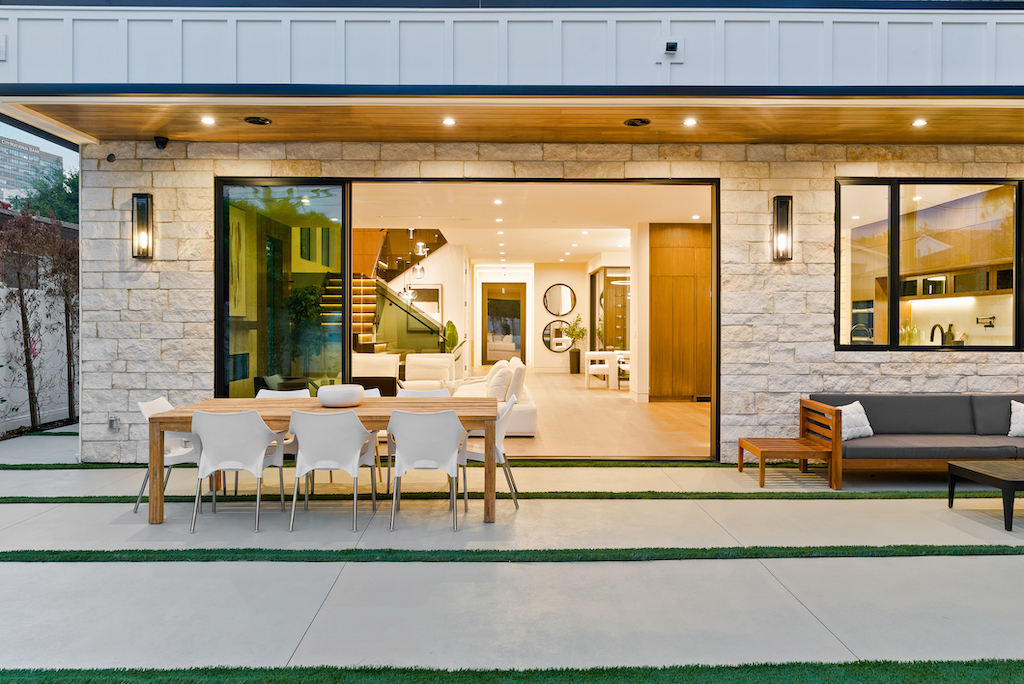 Modern home with open patio and dining table