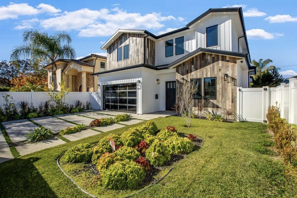 Modern house with landscaped front yard.