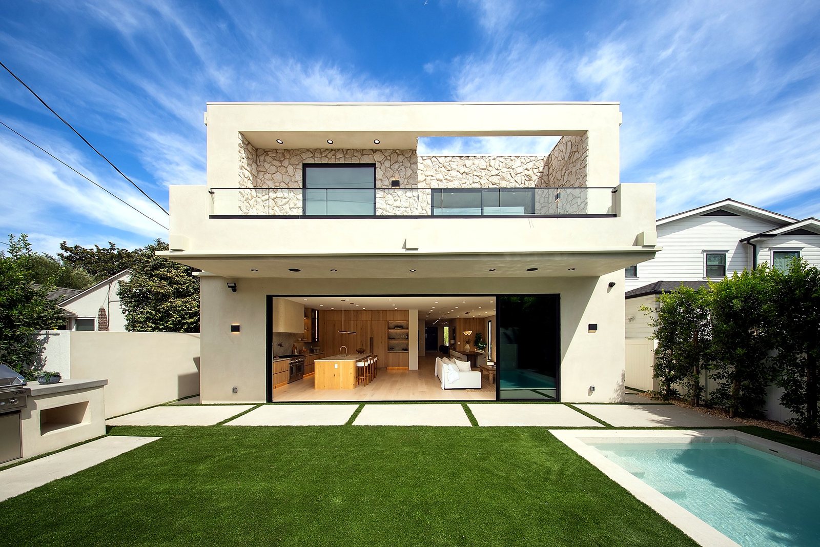 Rear elevation and pool of a Luxury Home Builders custom home
