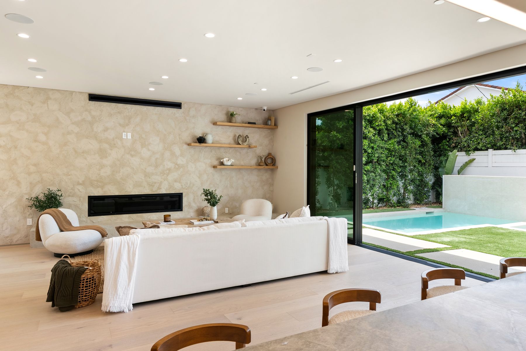Luxury Home Builders custom home living room with linear fireplace