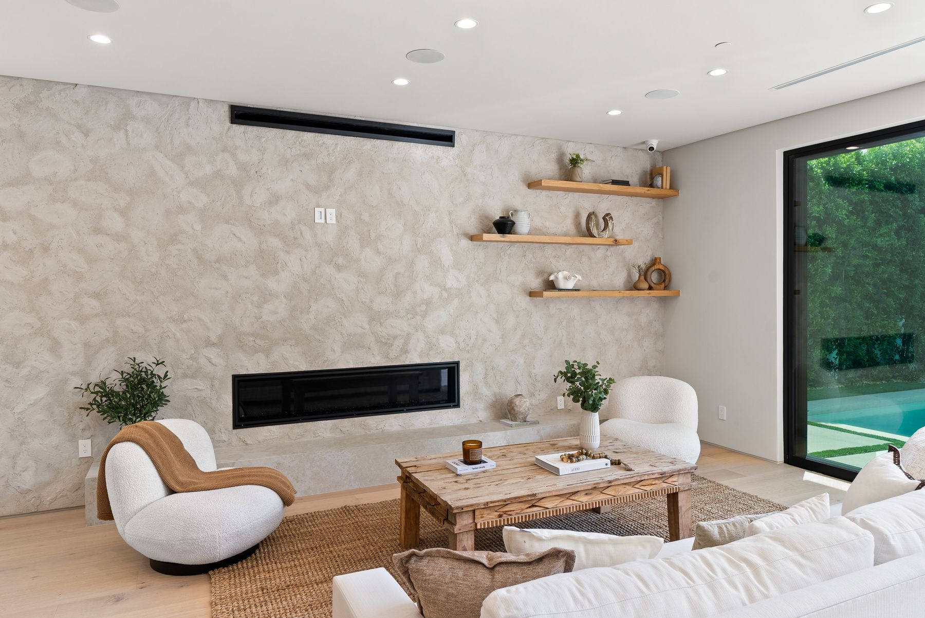 Luxury Home Builders custom home family room with linear fireplace