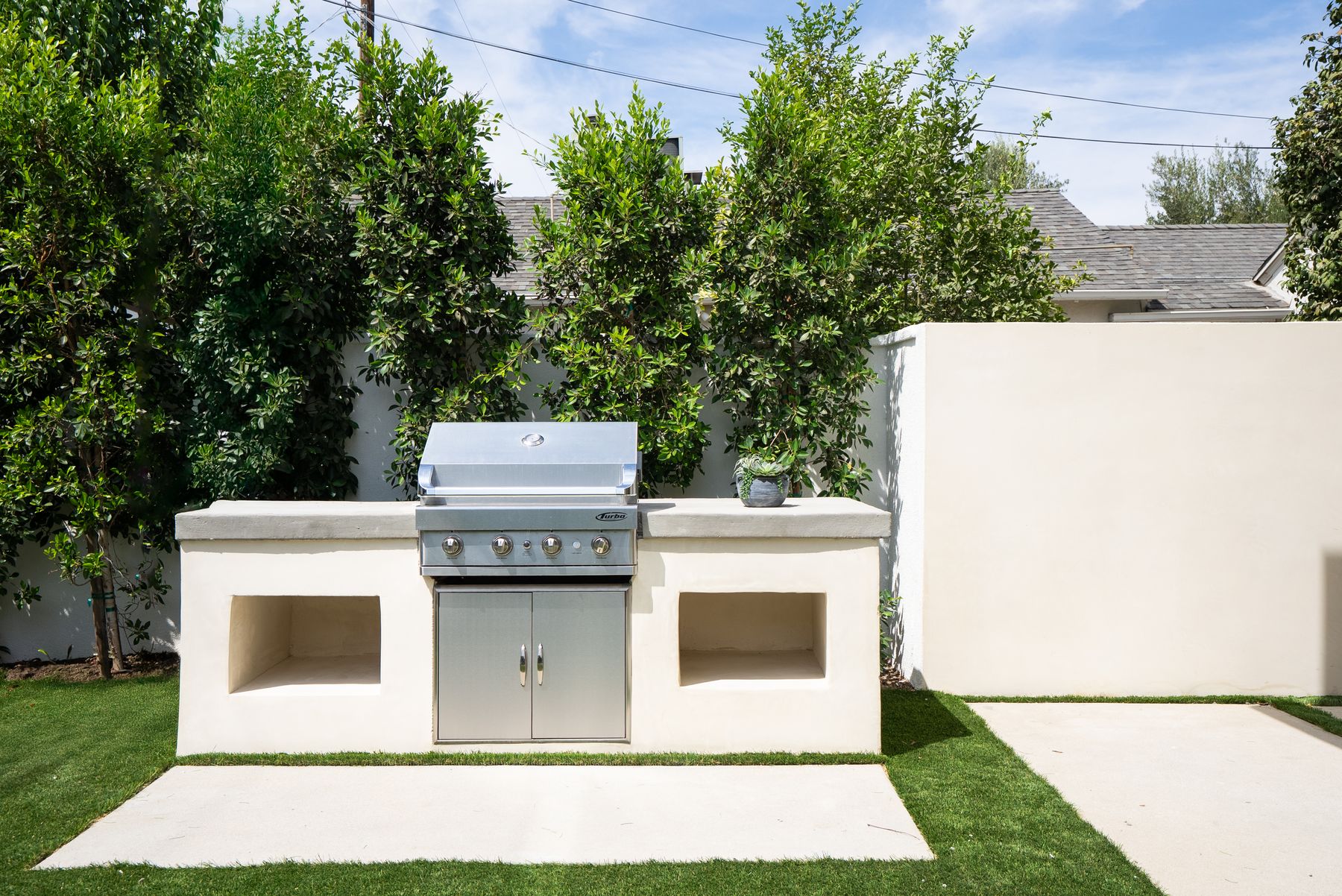 Luxury Home Builders custom home outdoor kitchen and barbecue