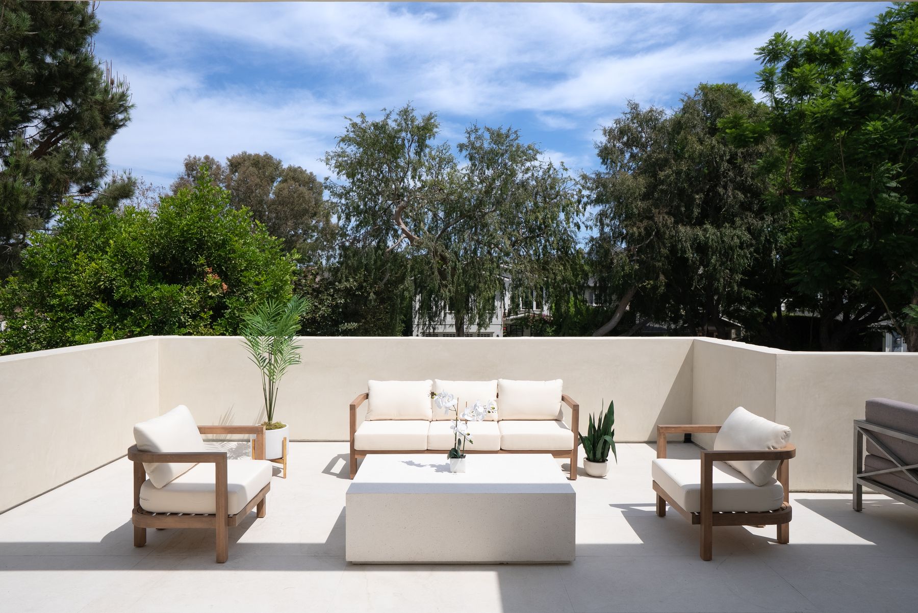 Luxury Home Builders custom home rooftop deck with outdoor lounge seating