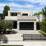 Luxury Home Builders custom home modern front exterior in daylight